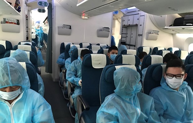 Một chuyến bay đưa công dân Việt Nam ở nước ngoài về nước. (Ảnh: TTXVN)