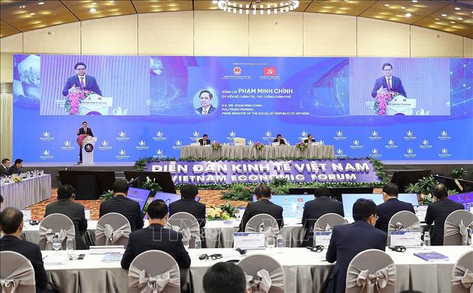 Thủ tướng Phạm Minh Chính phát biểu tại Diễn đàn Kinh tế Việt Nam. Ảnh: Dương Giang/TTXVN