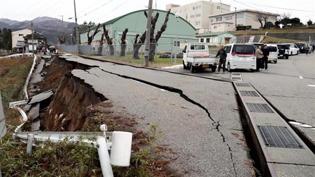 A road is damaged by the earthquake in Wajima city, Japans Ishikawa perfecture on January 1. (Photo: VNA)