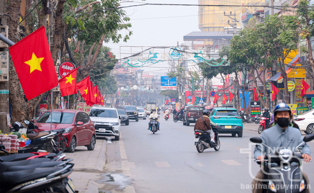 The streets are adorned with the bright colors of the national flag and the Partys flag to greet the new year 2025.