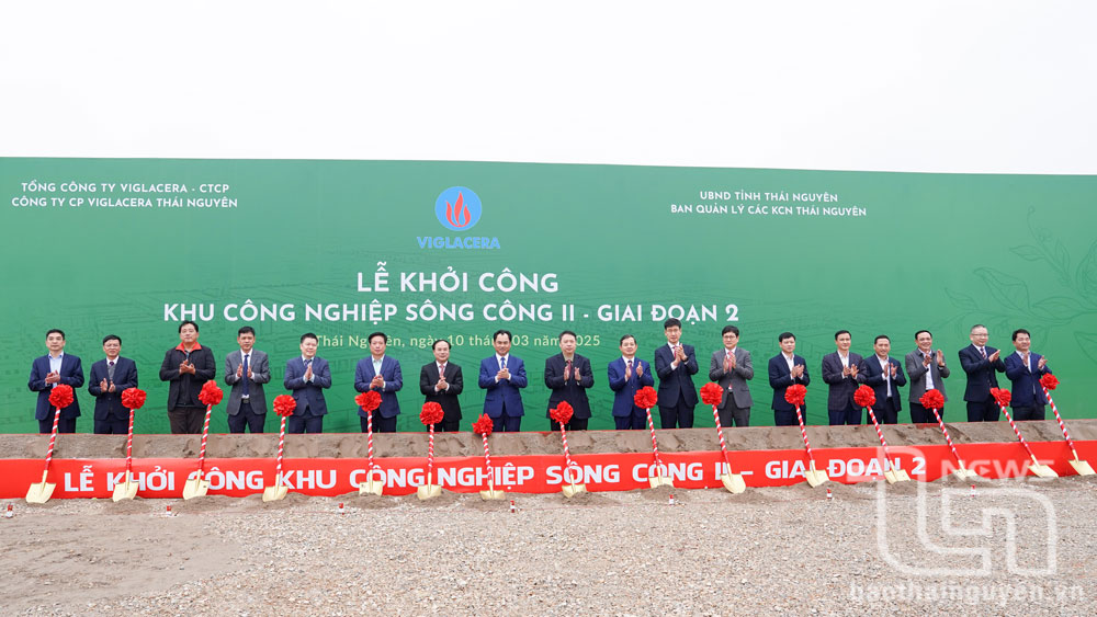 Delegates perform the groundbreaking ceremony of the project.