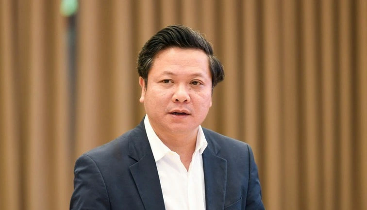 Ông Phan Trung Tuấn, Vụ trưởng Vụ Chính quyền địa phương, Bộ Nội vụ, trả lời câu hỏi của các phóng viên.