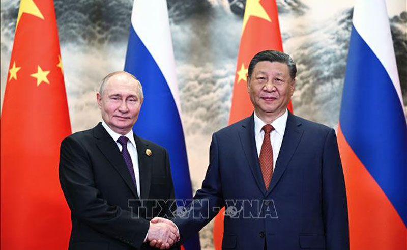 Chủ tịch Trung Quốc Tập Cận Bình (bên phải) và Tổng thống Liên bang Nga Vladimir Putin. Ảnh tư liệu: AFP/TTXVN