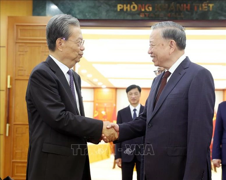 Tổng Bí thư Tô Lâm và Ủy viên trưởng Nhân đại toàn quốc Trung Quốc Triệu Lạc Tế - Ảnh: TTXVN