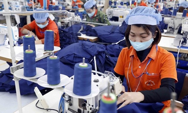 2023年越南纺织服装业出口额预计将达到403亿美元。图自越通社