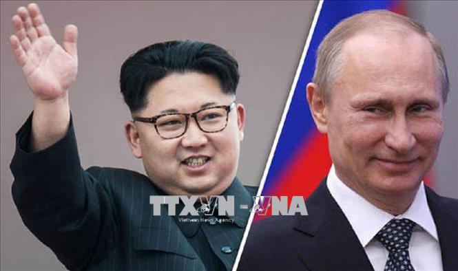 Chủ tịch Triều Tiên Kim Jong-un (trái) và Tổng thống Nga Vladimir Putin (phải). Ảnh: EXPRESS/TTXVN