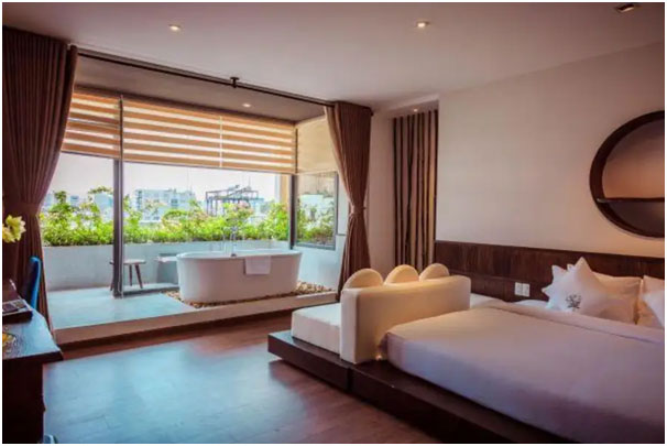 Nội thất phòng ngủ tại Cochin Zen Hotel.