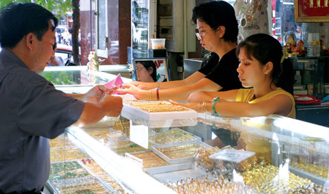 Giá vàng tăng nhẹ, USD giữ nguyên